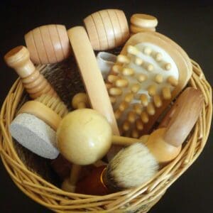 A basket of wooden hair brushes and combs.